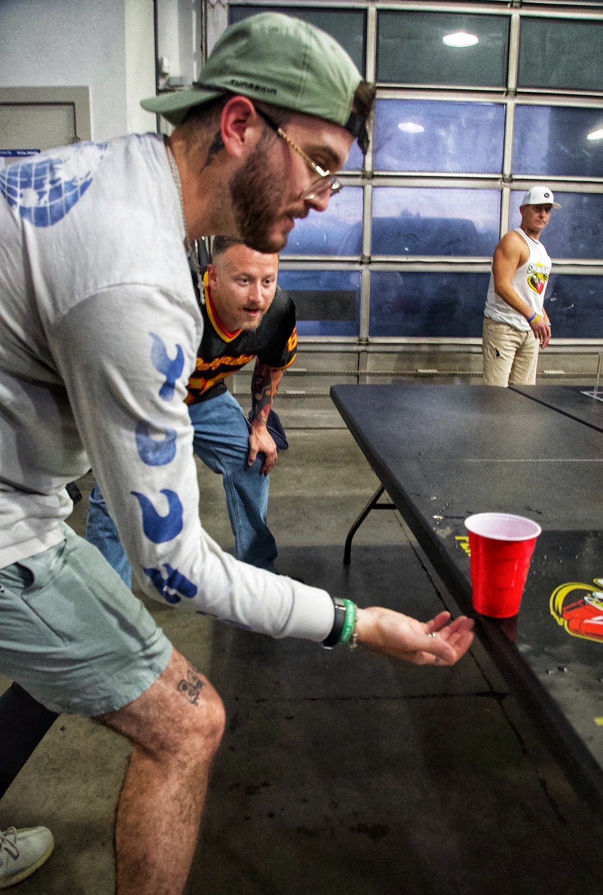 Shenanigans Pong - Fast-Paced Competitive Party Game Shoot, Bounce & Flip Cup Race Game. Includes 2 Silicone Mats, Cups & Balls  completive beer pong.